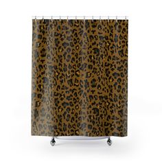 a shower curtain with an animal print pattern on the front and back of it,