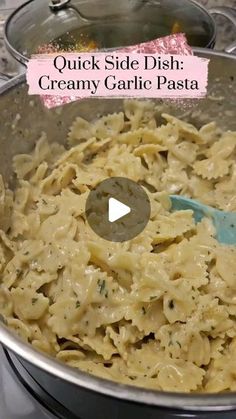 a pan filled with pasta on top of a stove