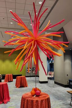 an orange and red decoration in the middle of a room