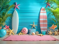 there are many surfboards and starfish on this beach scene with pink rugs