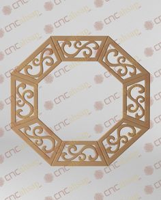 a wooden cutout with an intricate design on it