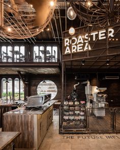 the inside of a restaurant with lots of tables and chairs