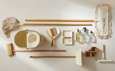 various cleaning supplies arranged on a white surface