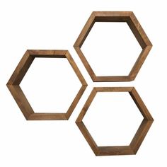 three wooden hexagonals on a white background