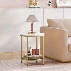 a living room scene with focus on the end table and lamp in the center piece