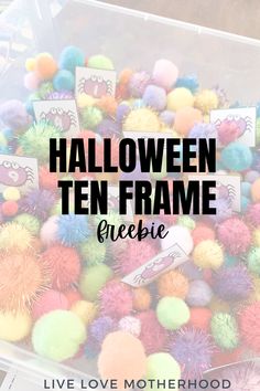 a plastic container filled with pom - poms and the words halloween ten frame freebie