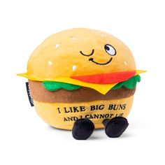 a stuffed hamburger that has been made to look like it's sitting on the ground