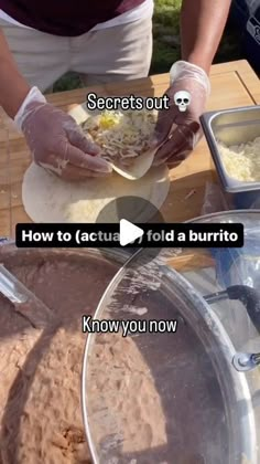 a person making food on top of a wooden table with words above it that read secrets out how to actua fold a burrito know you now