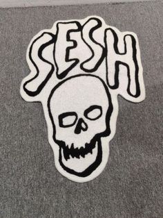 a sticker that says hell with a skull on it