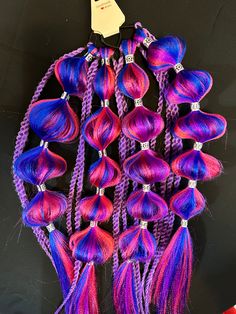 Pre-made hair extensions! Super easy to install (I can provide tutorials/instructions!) Great for festivals, special events, or every day use. Can be used multiple times!  ** Comes as a pair! There will be 2 ** ** Customized braids!! Please message me for color preference or style matching! I want to ensure you get the look you want!  They set come attached to hair ties for easy install, (clipins are available also upon request) these are good for any type of hair and can be styled in many different ways!   You can purchase these braids as they are in the picture or customize your own!  * No returns due to hygiene. Colorful Hair Extensions Braids, Rave Hair Extensions, Festival Hair Extension Braids, Rave Ponytail Extension, Colorful Ponytail, Colorful Hair Braid Extensions, Pink Hair Extensions Braids, Rainbow Hair Extensions, Braided Ponytails