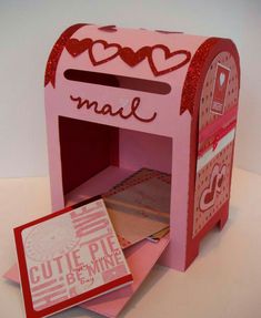 a valentine's day card box with mail inside