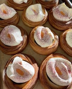 there are many pastries that are on the baking sheet together and ready to be eaten