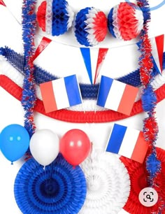 red, white and blue decorations with balloons