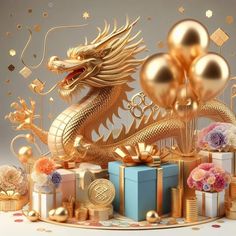 a golden dragon sitting on top of a pile of presents next to balloons and gifts