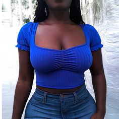 Trendy High Stretch Blue Tops, Blue Non-stretch Short Sleeve Top, Trendy Blue High-stretch Tops, Blue Cropped Elastane Top, Fitted Solid Color Casual Top, Blue Cropped Elastane Crop Top, Fitted Casual Solid Color Top, Blue Fitted Elastane Crop Top, Fitted Blue Elastane Crop Top