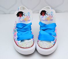 How adorable are these Mermaid inspired converse! The perfect shoe to complete the look! Please leave your name needed in the notebox during checkout Visit the tutu section or search bar for the matching outfit! If you are unsure of sizing please scroll to the last photos for our size charts, or visit our size charts here--> https://pinktoesnhairbows.com/pages/size-chart All sales are FINAL, Ship dates can be found directly on the listing, please view our policies in detail here---> https://pink Mermaid Shoes, Overalls Boys, Tutu Dress Costumes, Bling Converse, Girls Overalls, Girls Converse, Mermaid Inspired, Matching Outfit, Birthday Tutu