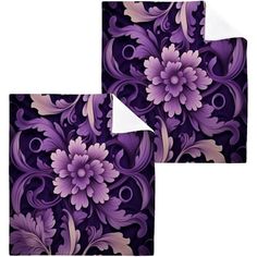 two purple and white floral designs on black background