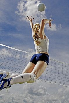 a woman jumping up to hit a volleyball ball with her racquet and the words don't let muscle fatigue control you