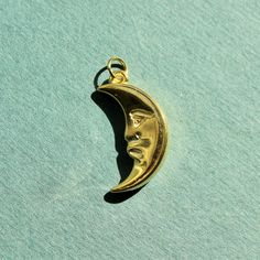 Size: 15x28mm Material: Gold plating over acrylic material The charm comes with a jump ring for threading on your favorite necklace or jewelry making. Gold Crescent Moon, Buddha Necklace, Vintage Moon, Gold Moon, Moon Charm, Threading, Gold Charm, Jump Rings, Crescent Moon