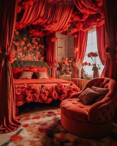 a bedroom decorated in red and pink with flowers on the bed, chair, and canopy