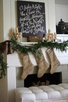 stockings hung on the mantel above a fireplace