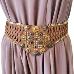 Vintage wide waist braided women's belt. Made of genuine leather in milk brown and metal details. 5 holes, hook fastening Size S Dimensions - 33.8''/86cm long end to end 29''/74cm long to the first hole 33''/84cm long to the last hole 4''/10cm wide /max/ Very good condition. Adjustable Corset Belt With Belt Loops For Festivals, Adjustable Corset Belt For Festivals, Brown Leather Rope Belt, Brown Leather Corset Belt For Festivals, Adjustable Brown Corset Belt With Matching Belt, Adjustable Brown Belt For Festival, Adjustable Brown Belts For Festival, Brown Corset Belt For Festivals, Leather Corset Belt For Festivals