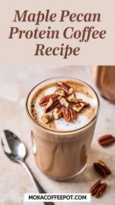 a cup of coffee with whipped cream and pecans on top