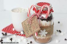 a jar filled with hot chocolate and marshmallows