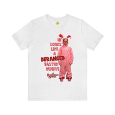 a white t - shirt with an image of a man in pink bunny costume on it