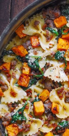 Creamy Butternut Squash Pasta with Sausage and Spinach in a stainless steel pan Butternut Squash Pasta With Sausage, Pasta With Sausage And Spinach, Creamy Butternut Squash Pasta, Butternut Squash Recipes Pasta, Sausage And Spinach, Creamy Butternut Squash, Pasta With Sausage, Butternut Squash Pasta, Squash Pasta