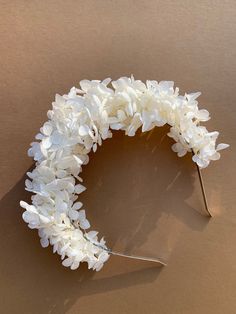 Flower crown with beige hydrangea. Wedding flower boutonniere and corsage ------------------------------------------ NOTE! We tried to show the product in different daylight - both in sunlight and in the shade in order to show the shades of colors and materials as much as possible. BUT unfortunately, due to the color correction of the screens of phones/tablets/laptops, they will still be distorted. BUT our jewelry is still very beautiful and we are sure that you will not be disappointed :) ----- Modern Flower Crown, Bride Flower Headband, Big Flower Crown, Hydrangea Flower Crown, White Flower Headband, Bridesmaid Crown, Flower Crown Bridesmaid, White Flower Crown, Preserved Hydrangea