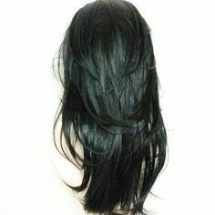 the back of a woman's head with black hair