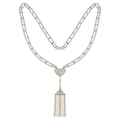 A Belle Epoque natural pearl and diamond sautoir necklace, centred with an openwork plaque of geometric design, encrusted with swiss-cut diamonds and pearls, suspending two pear-shaped pearls and a diamond bead terminating to a tassel, the scroll-designed top of the tassel suspending a fringe of three diamond-encrusted rows and six graduating rows of natural pearls, all hung from a long mesh chain of natural seed pearls and twenty one old-cut diamonds, accompanied by GCS Report stating that the Diamonds And Pearls, Diamond Choker Necklace, Jewellery Indian, Diamond Choker, Pearl Choker Necklace, Estilo Art Deco, Natural Pearl, Deco Jewelry, Bridal Jewellery