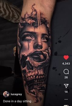 a man's arm with a tattoo on it and a skull in the middle