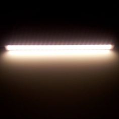 an image of a light that is on in the dark with no one around it