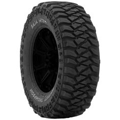 an all terrain tire on a white background