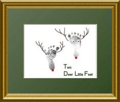 two little deers with red noses and antlers on their heads are shown in a gold frame