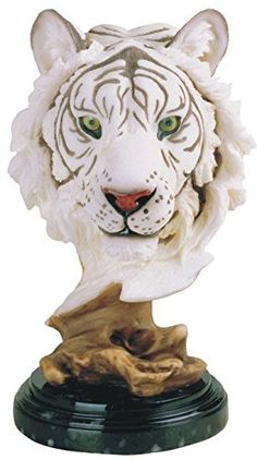 a white tiger head on top of a green base