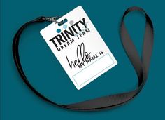 a lanyard with a name tag attached to it