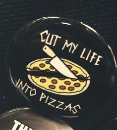 three buttons that say cut my life into pizzas and one has a knife on it