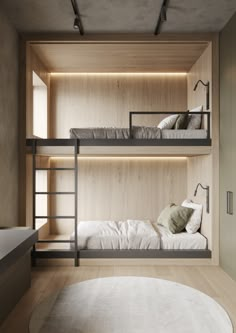 two bunk beds in a room with wooden walls and flooring, along with a round rug on the floor