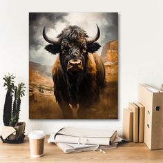 a painting of a bison on a wall above a desk with books and planters