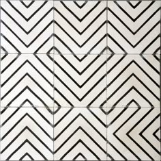 some black and white tiles with lines on them