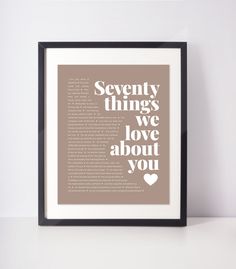 a framed poster with the words seventy things we love about you in white and brown