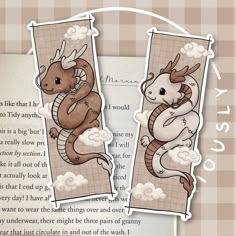 two bookmarks with an image of a dragon and a mouse on them, one is in the shape of a rectangle