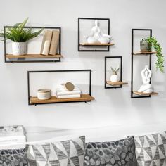 a living room filled with lots of furniture and bookshelves on top of each other