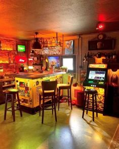 an image of a game room setting with arcade machines and stools on the floor