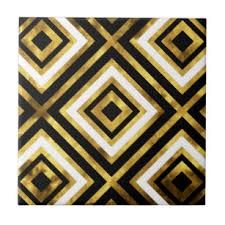 an abstract gold and black tile design