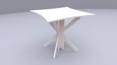 a white table sitting on top of a gray floor