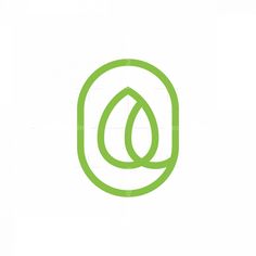 the letter q is made up of green leaves and has an oval shape on it